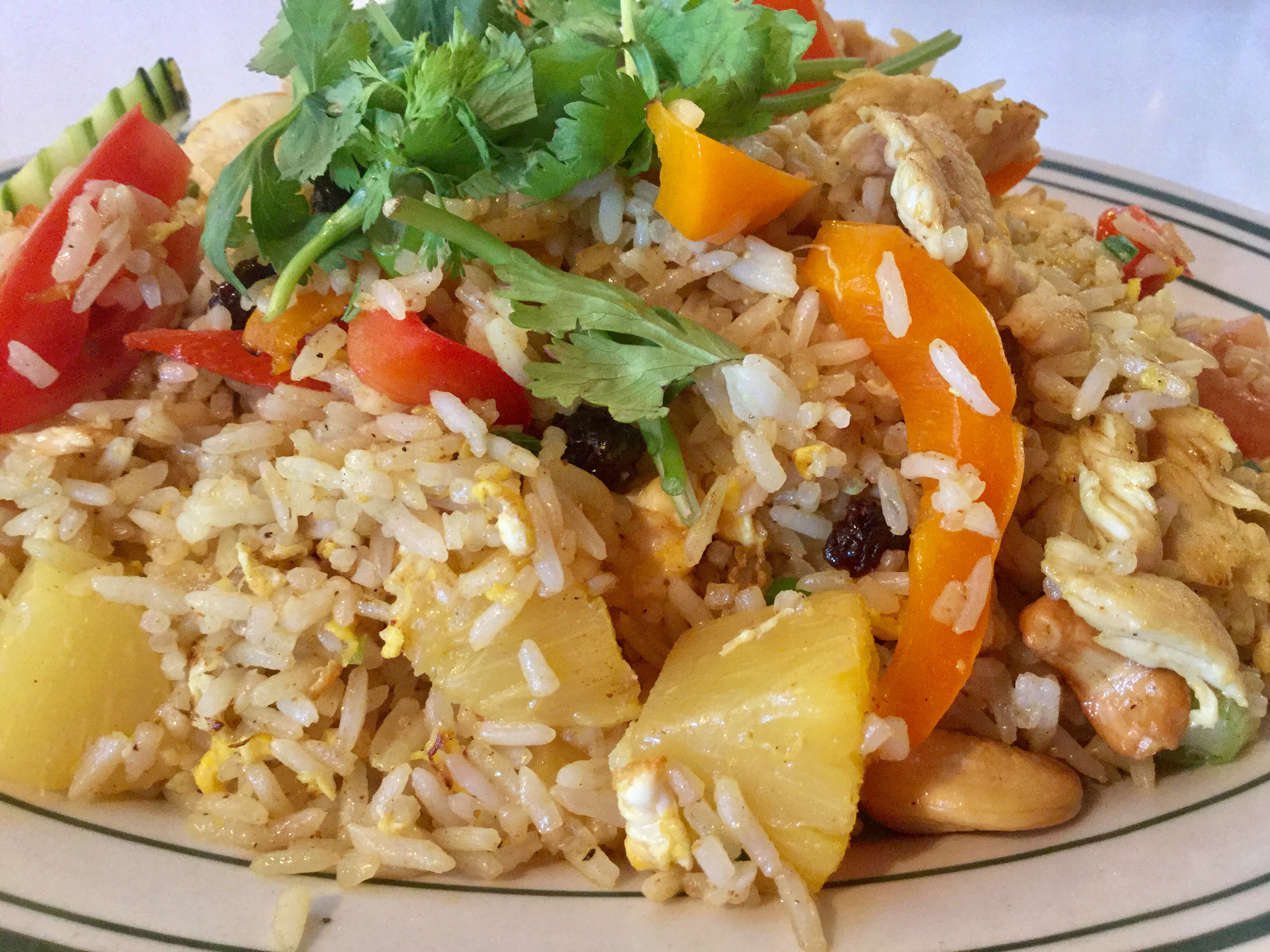 Order 80. Pineapple Fried Rice food online from Khun Dang Thai Restaurant store, North Hollywood on bringmethat.com