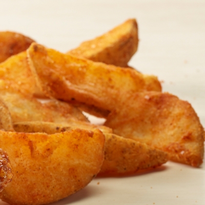 Order Spicy Potato Wedges food online from Royals Hot Chicken store, Louisville on bringmethat.com