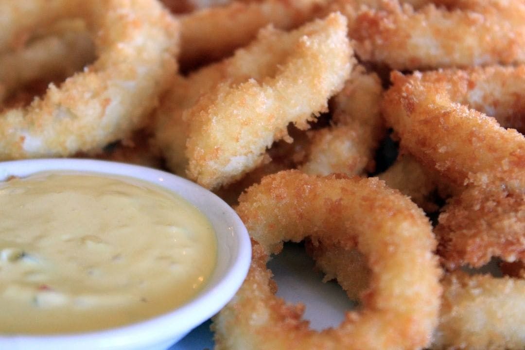 Order Fried Calamari - Half (Serves 1 Person) food online from Cucina Family Style Restorante store, East Quogue on bringmethat.com