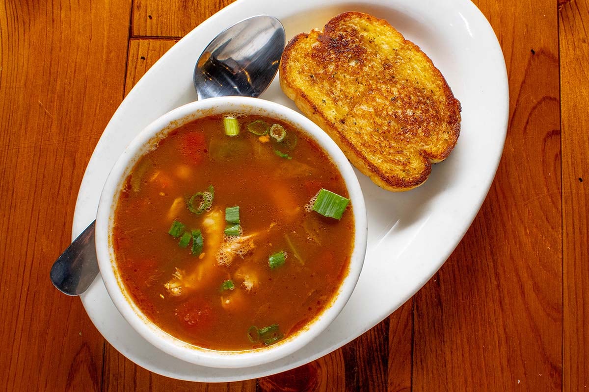 Order Seafood Gumbo - Cup food online from Boudreaux's Cajun Kitchen store, Houston on bringmethat.com