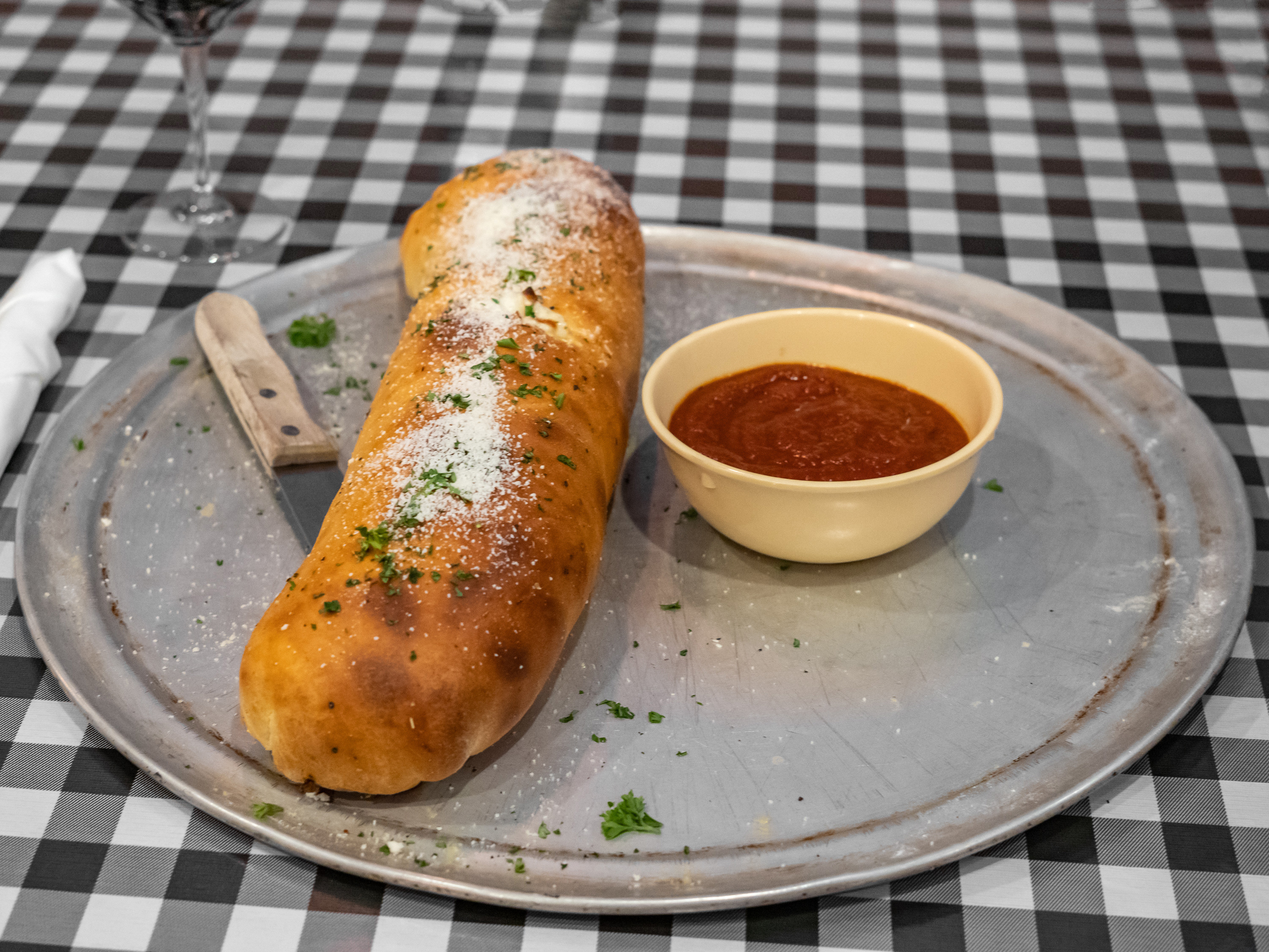 Order Traditional Stromboli food online from Nora's Pizzeria store, Hendersonville on bringmethat.com