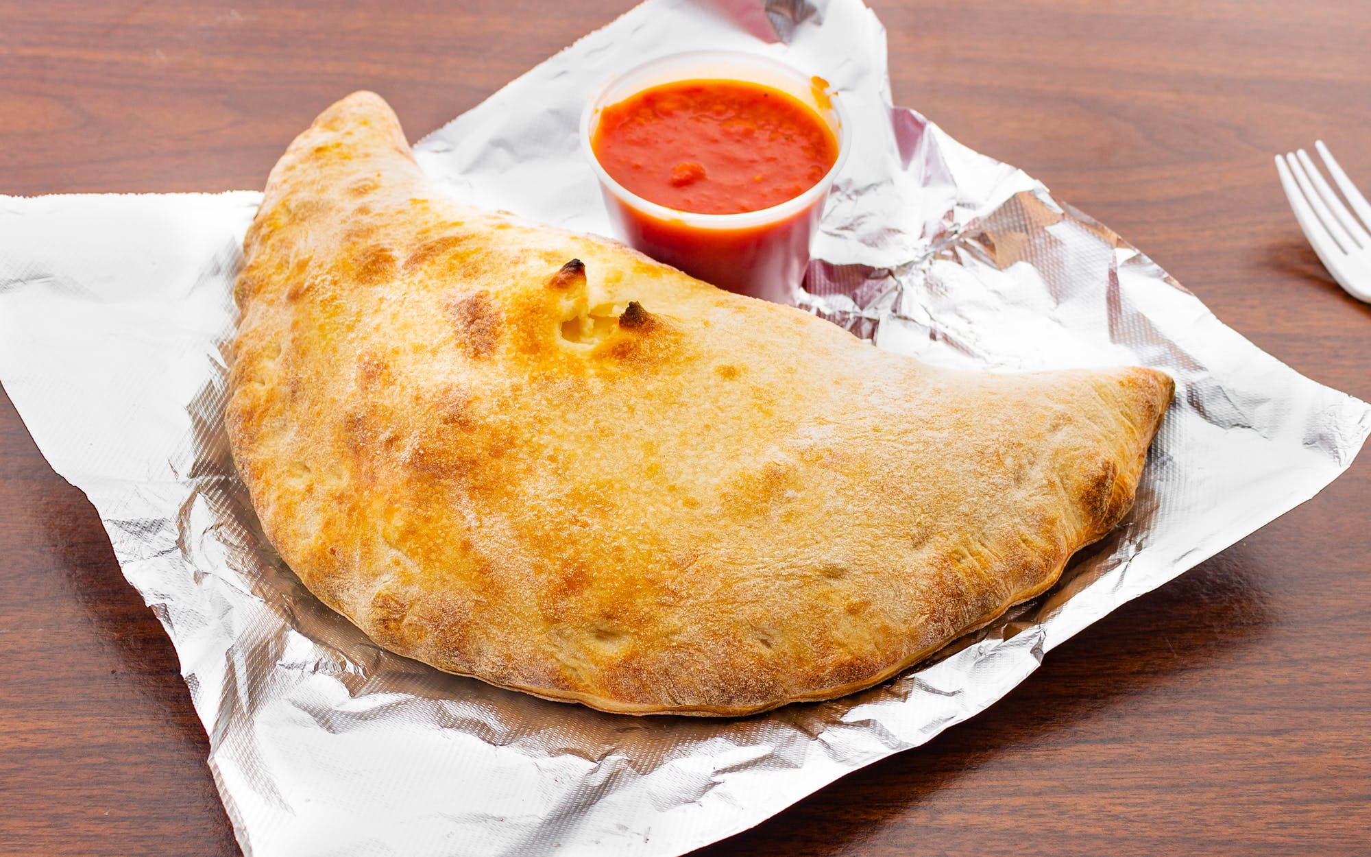 Order Calzone  food online from Donna Pizza store, Palisades Park on bringmethat.com