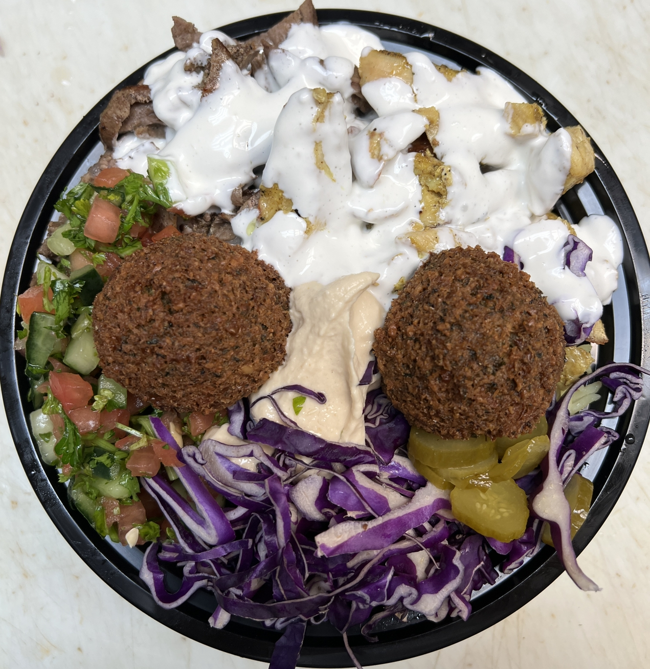 Order Sandstorm Bowl ( Steak and Chicken Shawarma and Falafel ) food online from Zam zam middle eastern grill store, Chicago on bringmethat.com