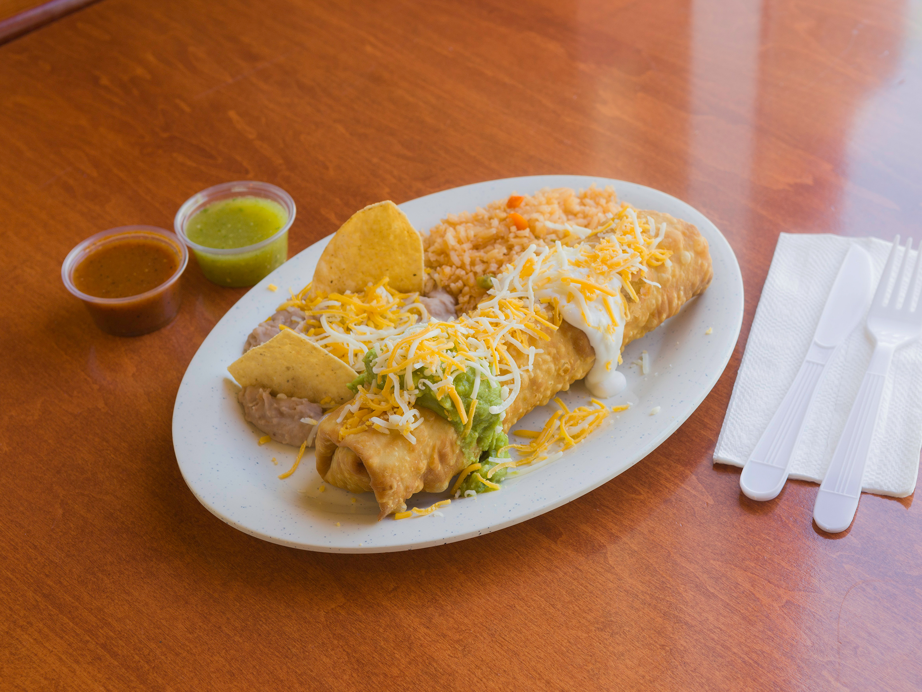 Order 11. Chimichanga Combo food online from Tosinos Mexican Grill store, Gilbert on bringmethat.com