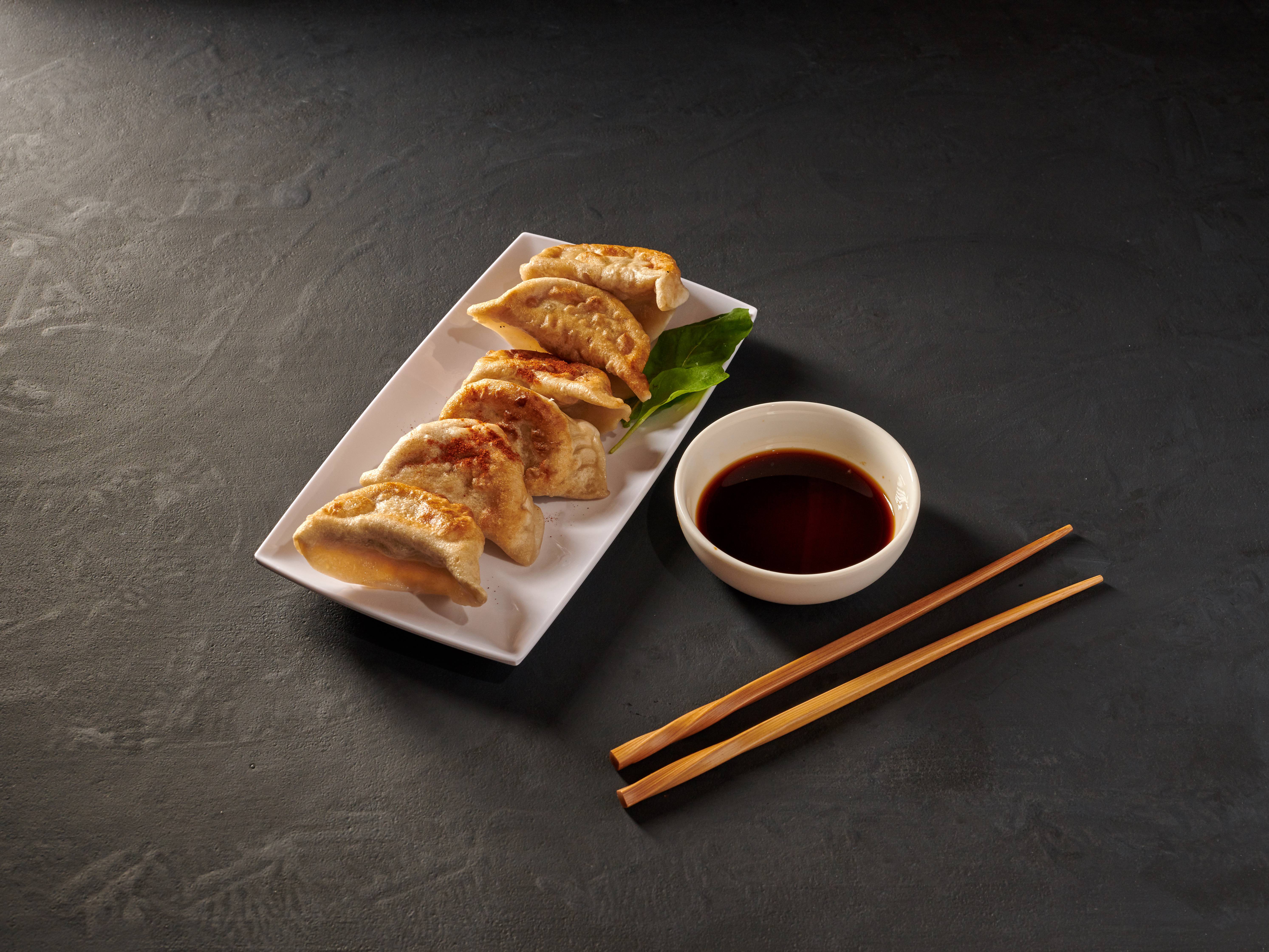 Order 11. Fried Dumplings food online from Panda Chinese Restaurant store, Washington on bringmethat.com