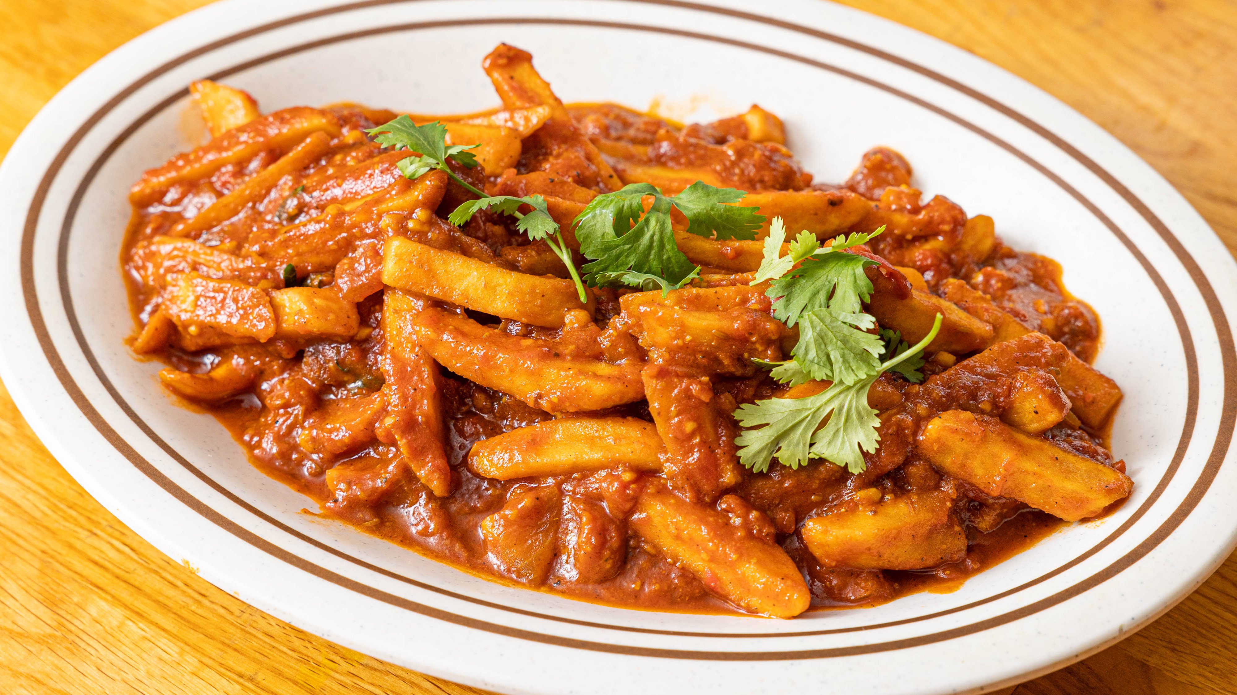 Order Masala Fries  food online from Flavors Express store, San Diego on bringmethat.com