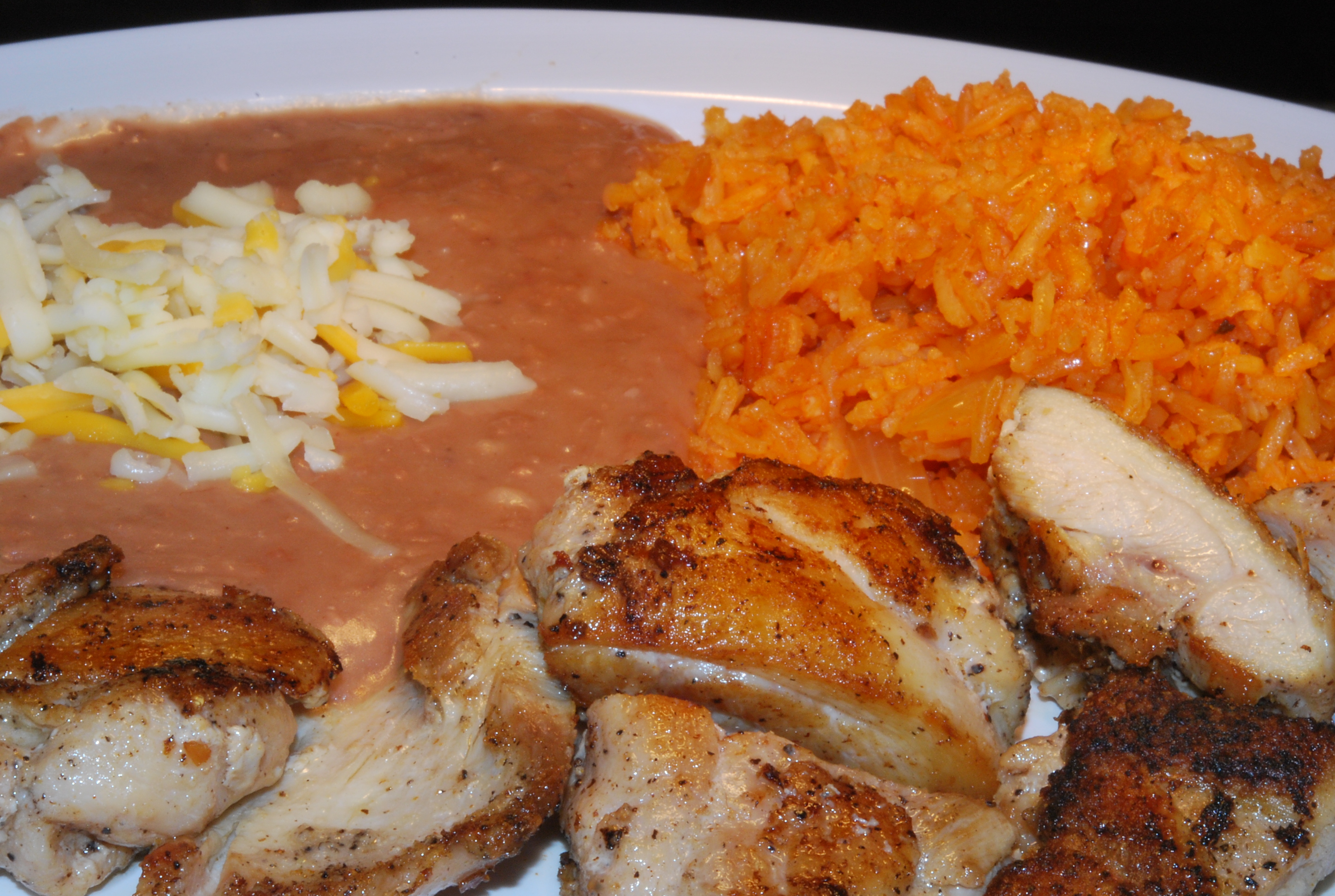 Order Grilled Chicken Combination Plate food online from Taqueria Cazadores store, Santa Clara on bringmethat.com