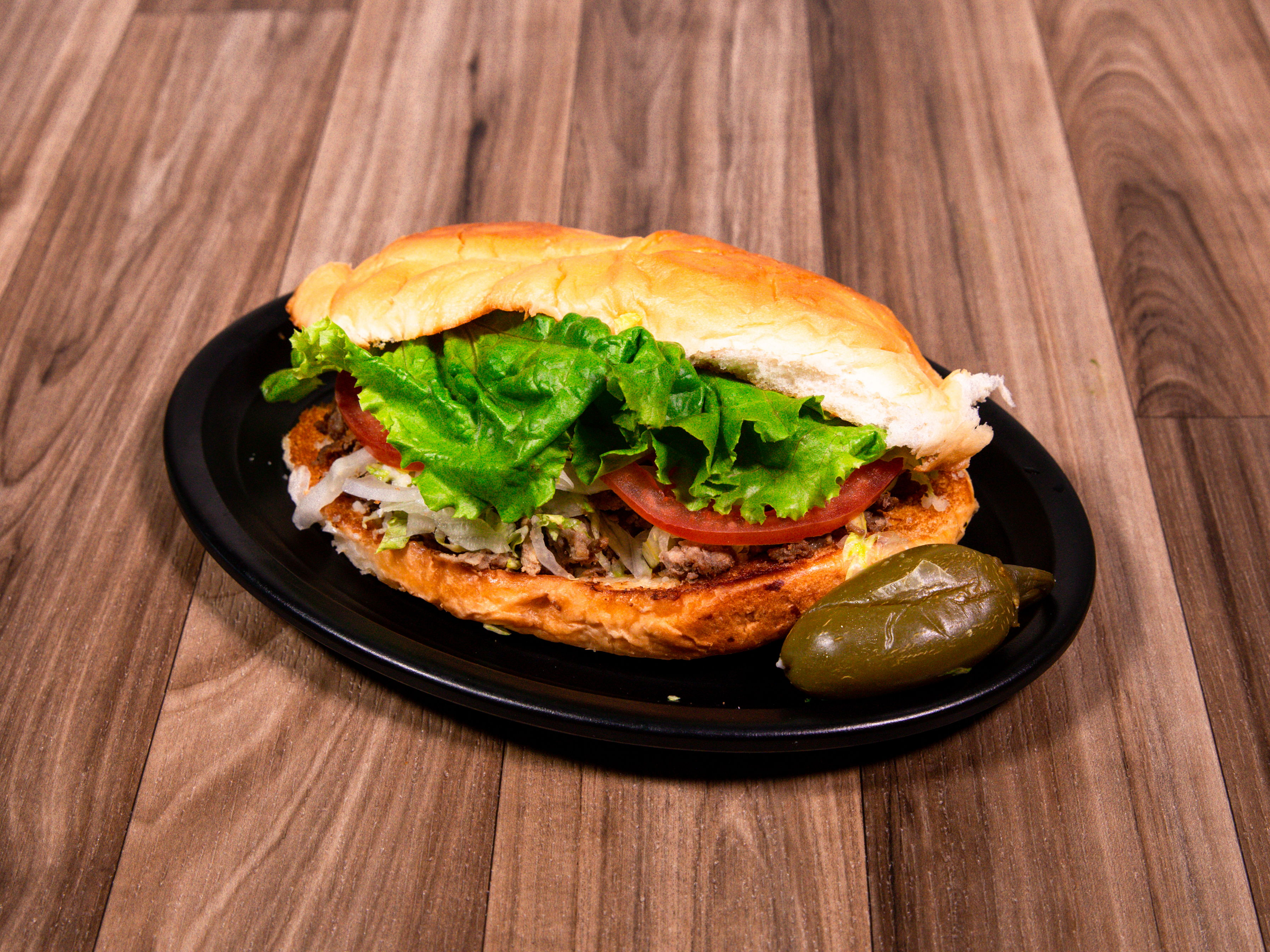 Order Torta de Carne food online from Cesar Tacos store, Fort Worth on bringmethat.com
