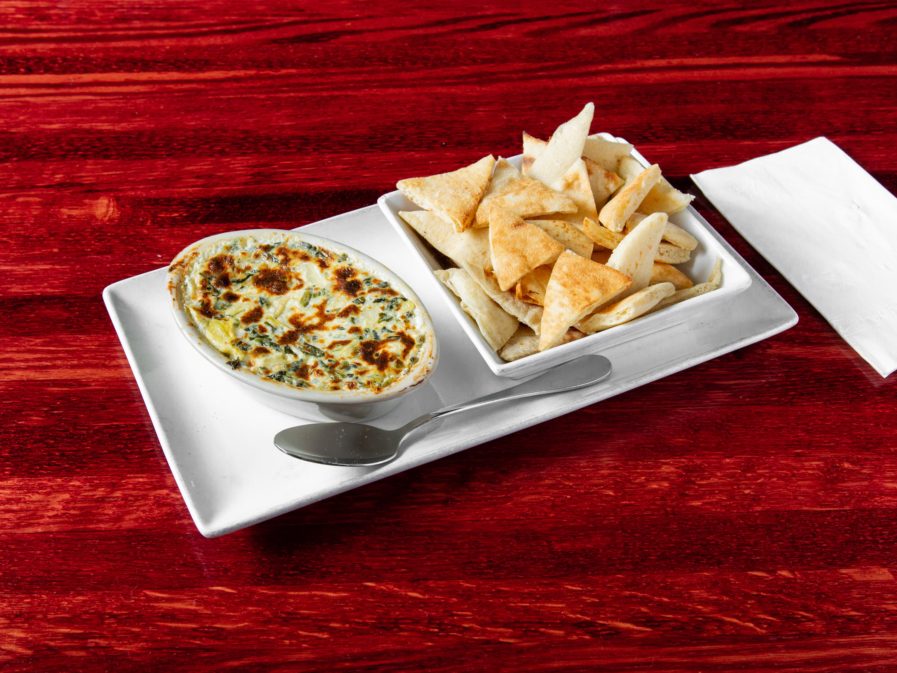 Order Baked Spinach And Artichoke Dip food online from Earth, Wood & Fire store, Fallston on bringmethat.com