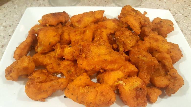 Order Fish Pakora - 1lb food online from Sansar Indian Restaurant store, Tracy on bringmethat.com