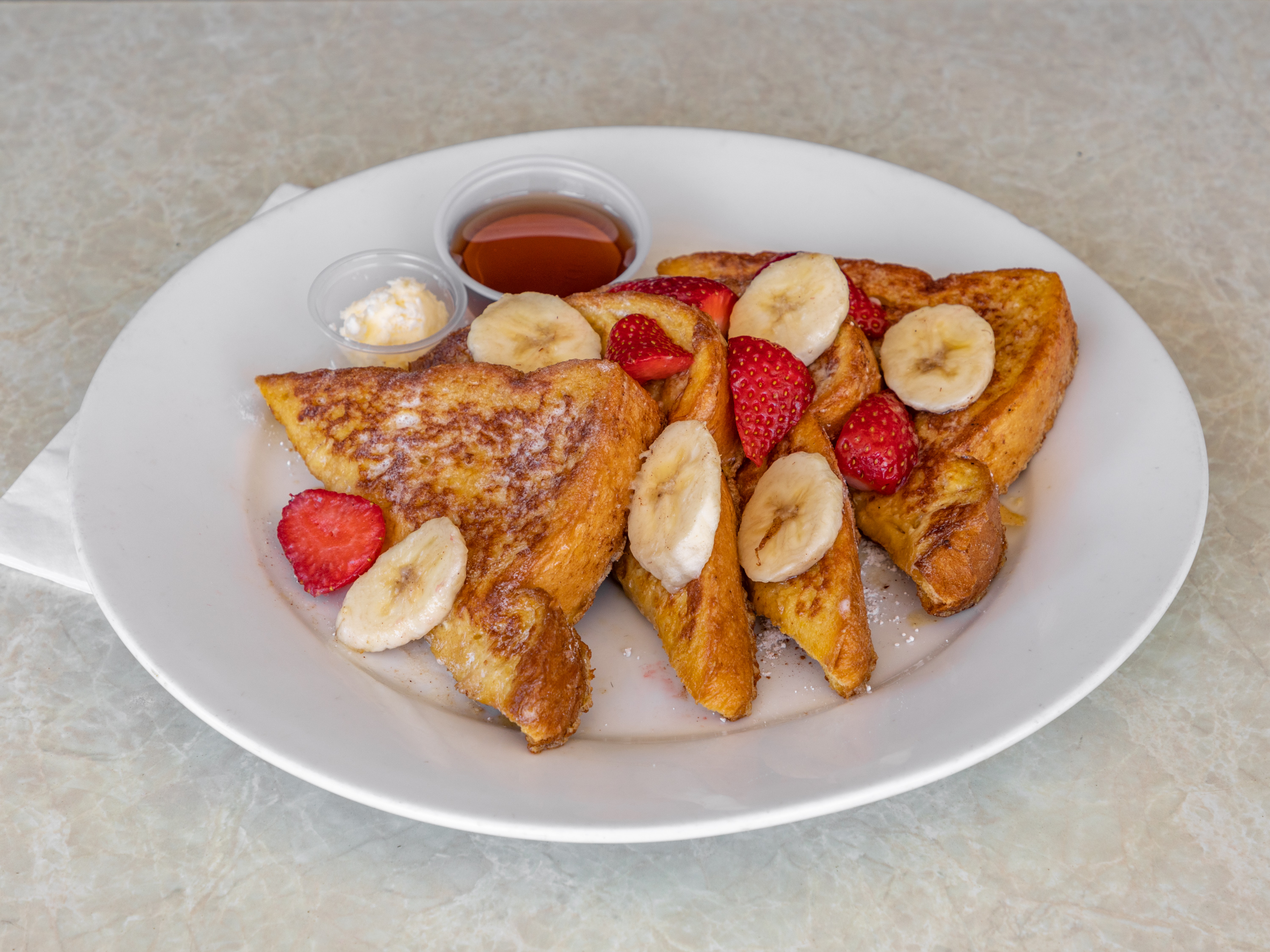Order 4 Halves French Toast food online from Puerto Nuevo Restaurant store, Los Angeles on bringmethat.com