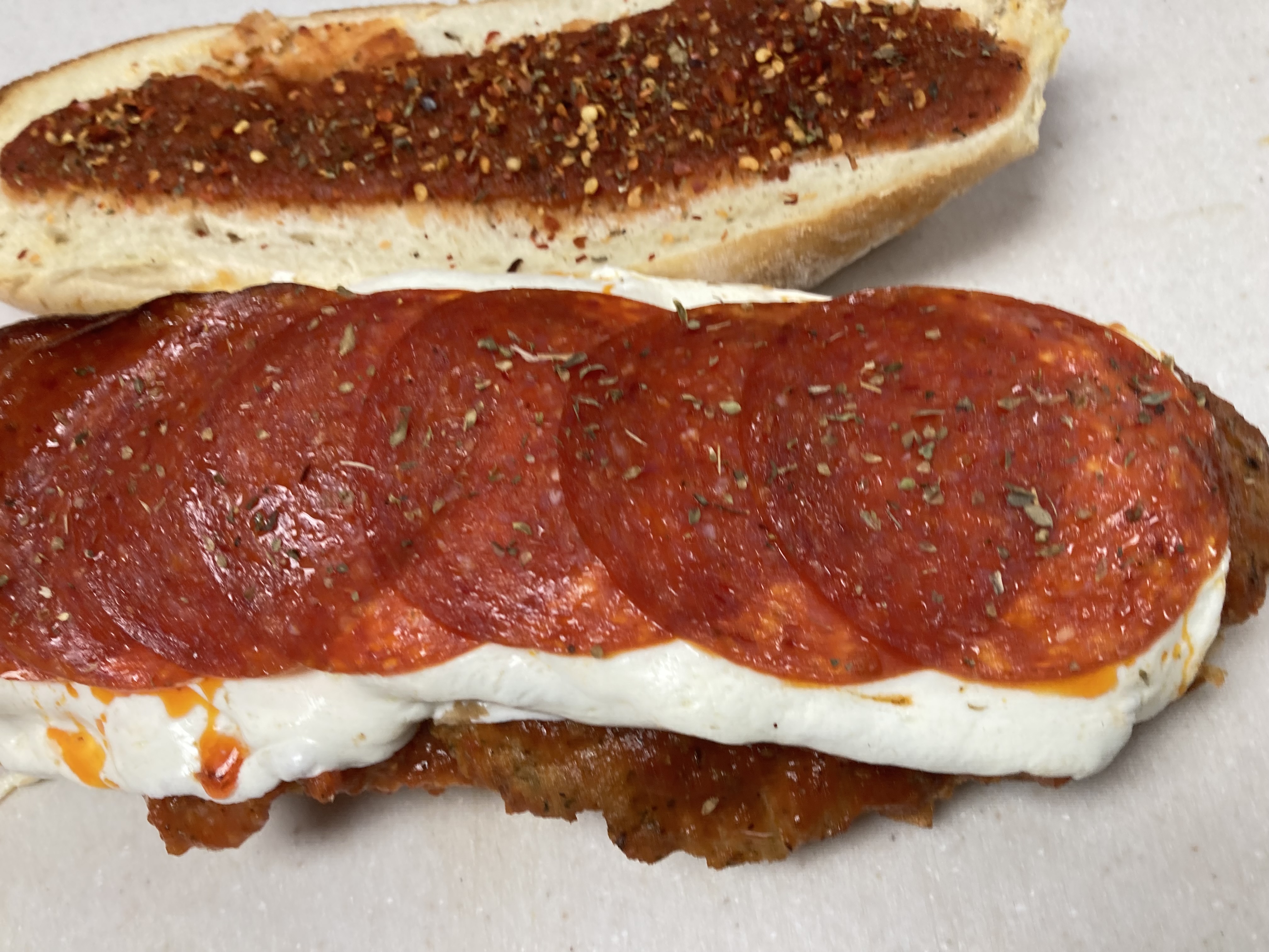 Order Spicy Chicken Parmigiana Sandwich food online from Sub-Ology store, Cranford on bringmethat.com