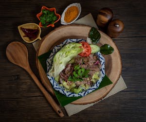 Order Thai Beef Salad food online from Morningside Thai Restaurant store, Houston on bringmethat.com