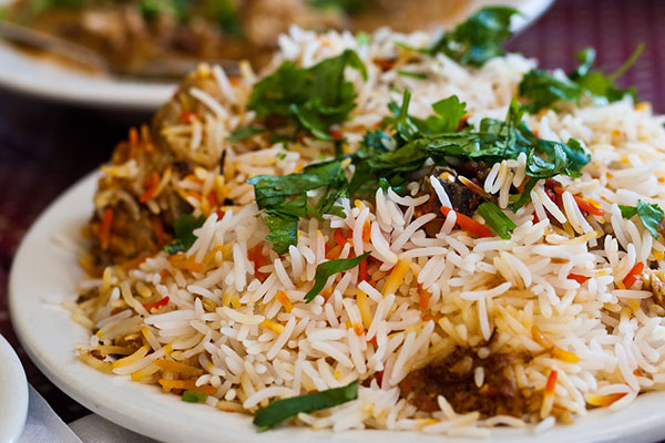 Order Goat (With Bone) Dum Biryani food online from Passage To India store, Tempe on bringmethat.com