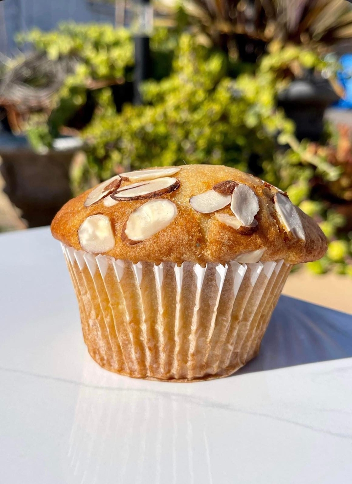 Order (V)  Almond Apricot Muffin food online from Moe Coffee Northpark store, San Diego on bringmethat.com