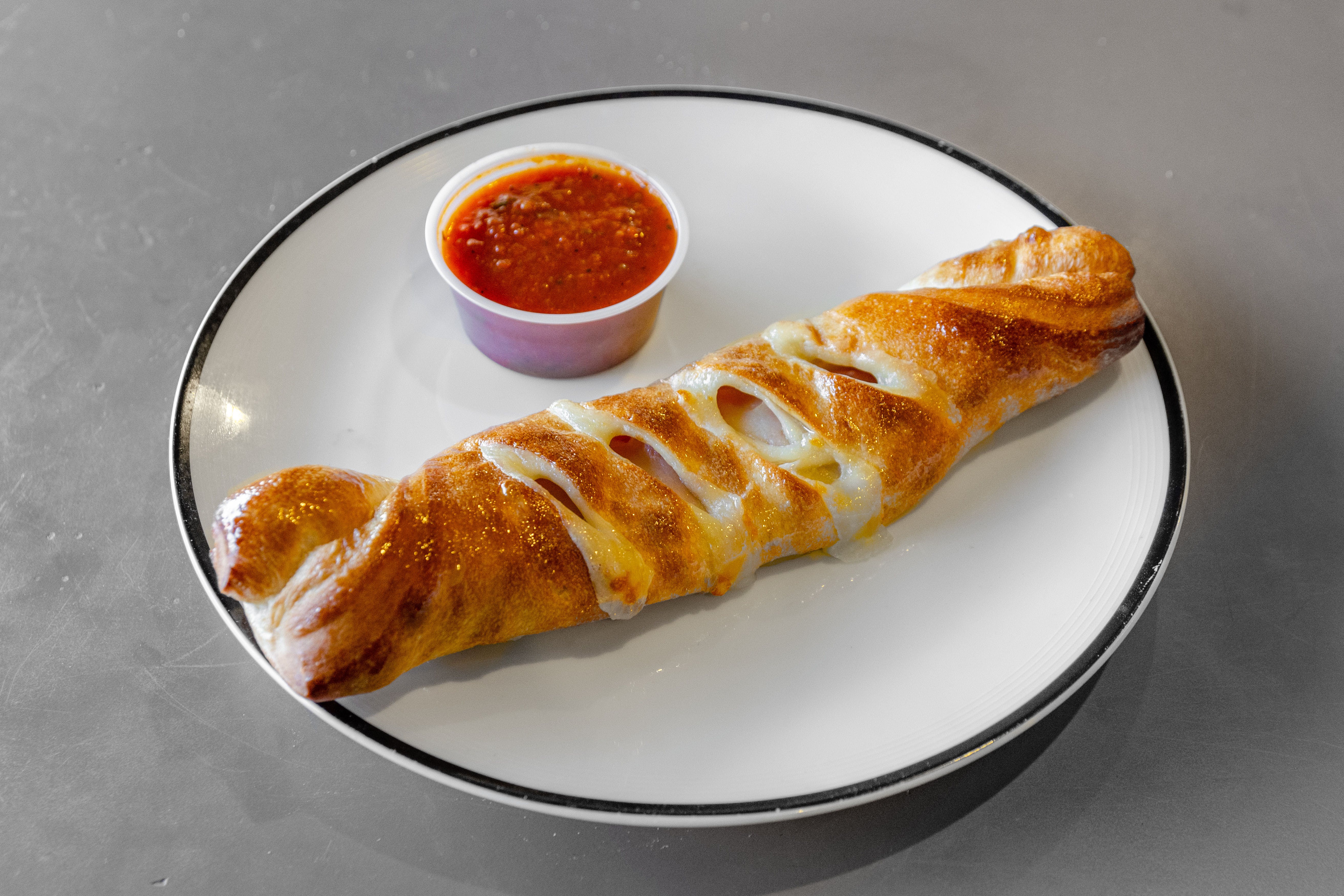 Order Pepperoni Roll - Roll food online from Piazza pizza store, Astoria on bringmethat.com