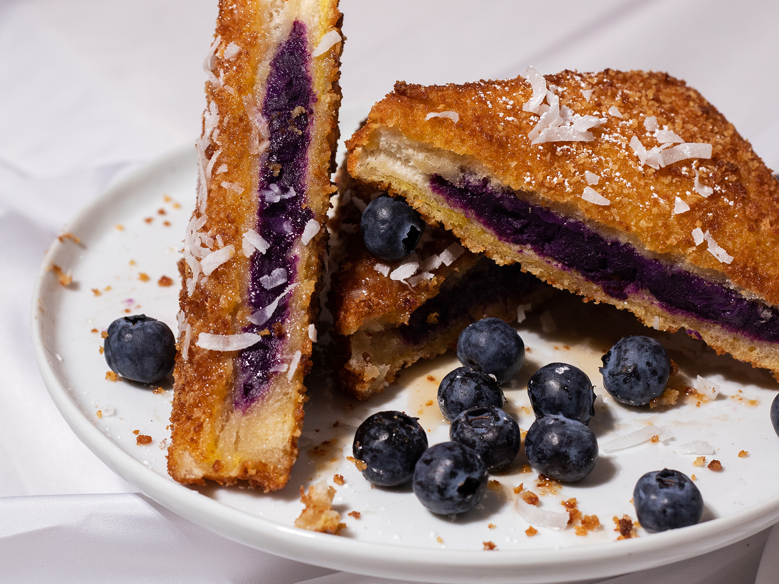 Order Ube French Toast food online from Popping Yolk Cafe store, Alhambra on bringmethat.com