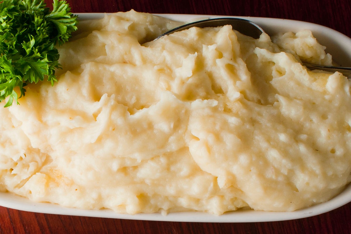 Order GARLIC MASHED POTATOES food online from Sullivan's store, Indianapolis on bringmethat.com
