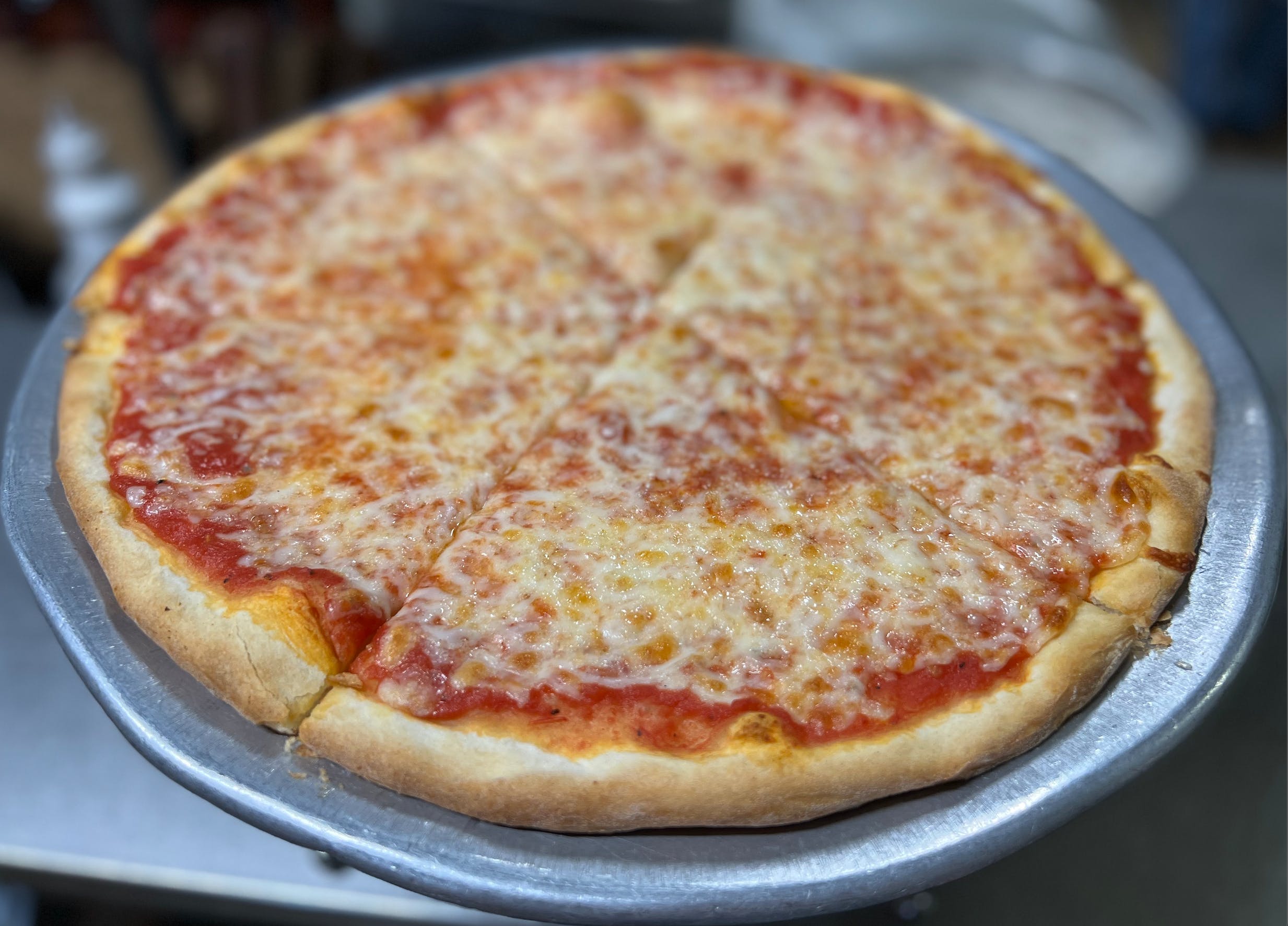 Order NY Style Thin Crust Cheese Pizza - Small 10'' food online from Napoli Pizza & Pasta store, Houston on bringmethat.com
