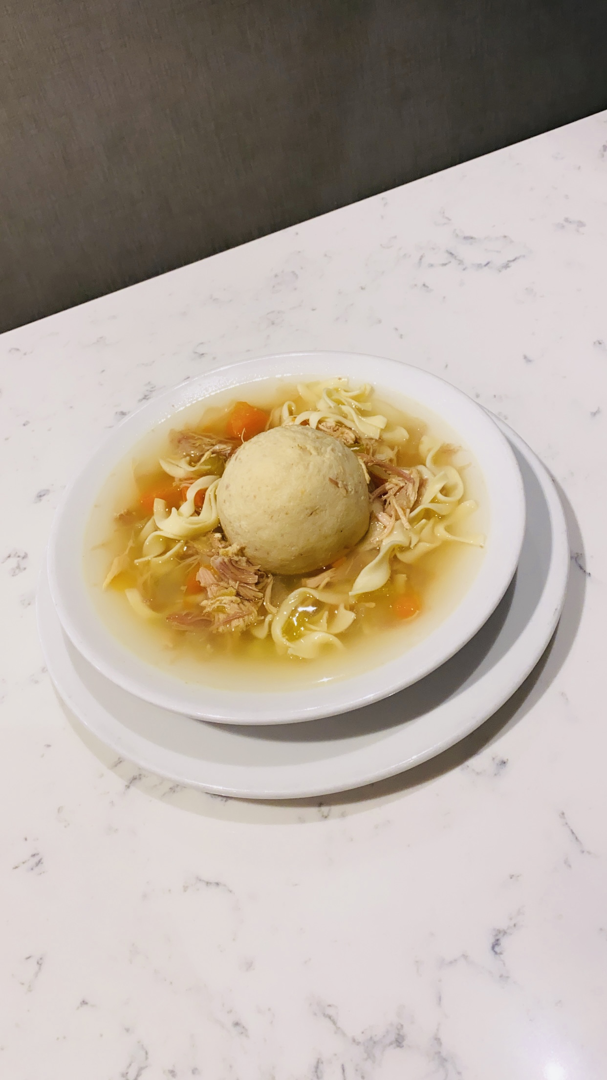 Order Homestyle Chicken Noodle Matzo Ball Soup - Matzoh Balls in the Soup! food online from Rye Ridge Deli store, Westport on bringmethat.com