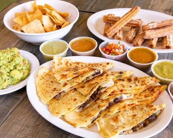 Order Quesadilla Platter (Includes Churros) food online from Benny's Tacos & Chicken Rotisserie - Culver City store, Los Angeles on bringmethat.com