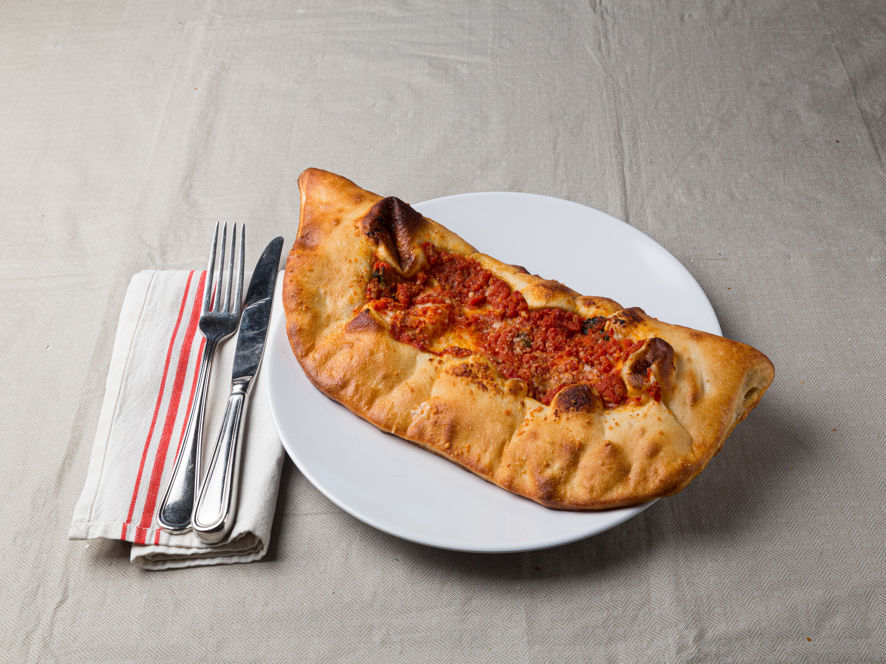 Order Pollo Calzone food online from Nely Restaurant & Pizza store, Yonkers on bringmethat.com