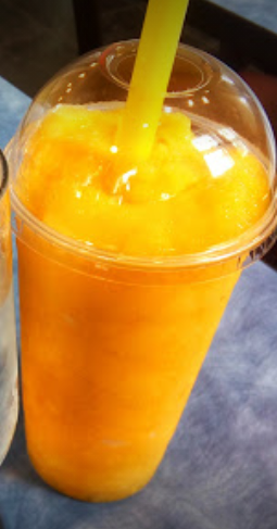 Order Mango Smoothie food online from Café Bali store, Bloomington on bringmethat.com