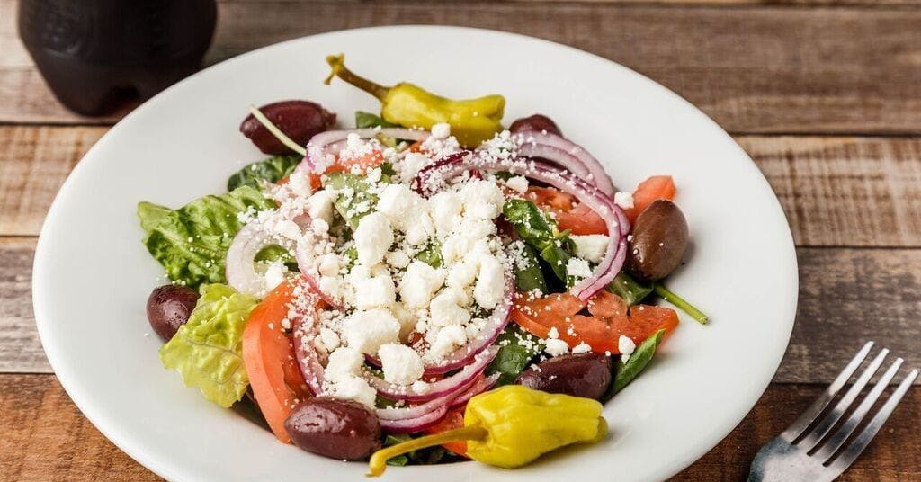 Order Greek Salad - Salad food online from Athens Pizza store, Athens on bringmethat.com
