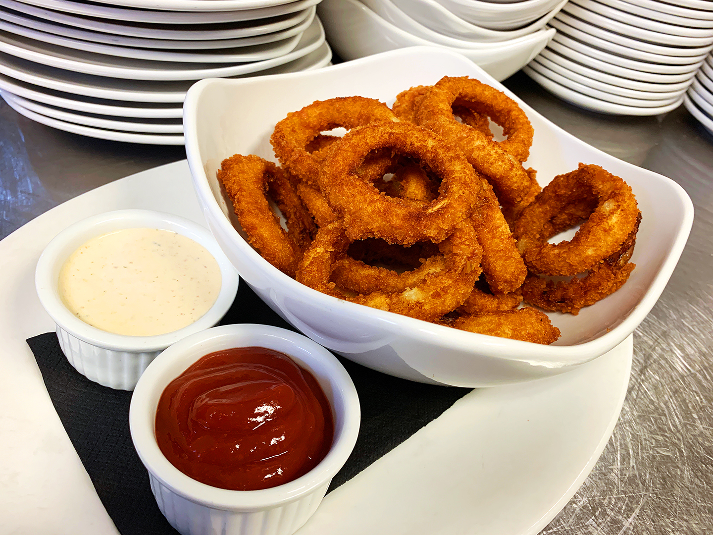 Order Onion Rings food online from The Over/Under Bar & Grill store, Saint Louis on bringmethat.com