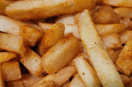 Order Old Bay French Fries food online from Pudge Steaks & Hoagies store, Blue Bell on bringmethat.com