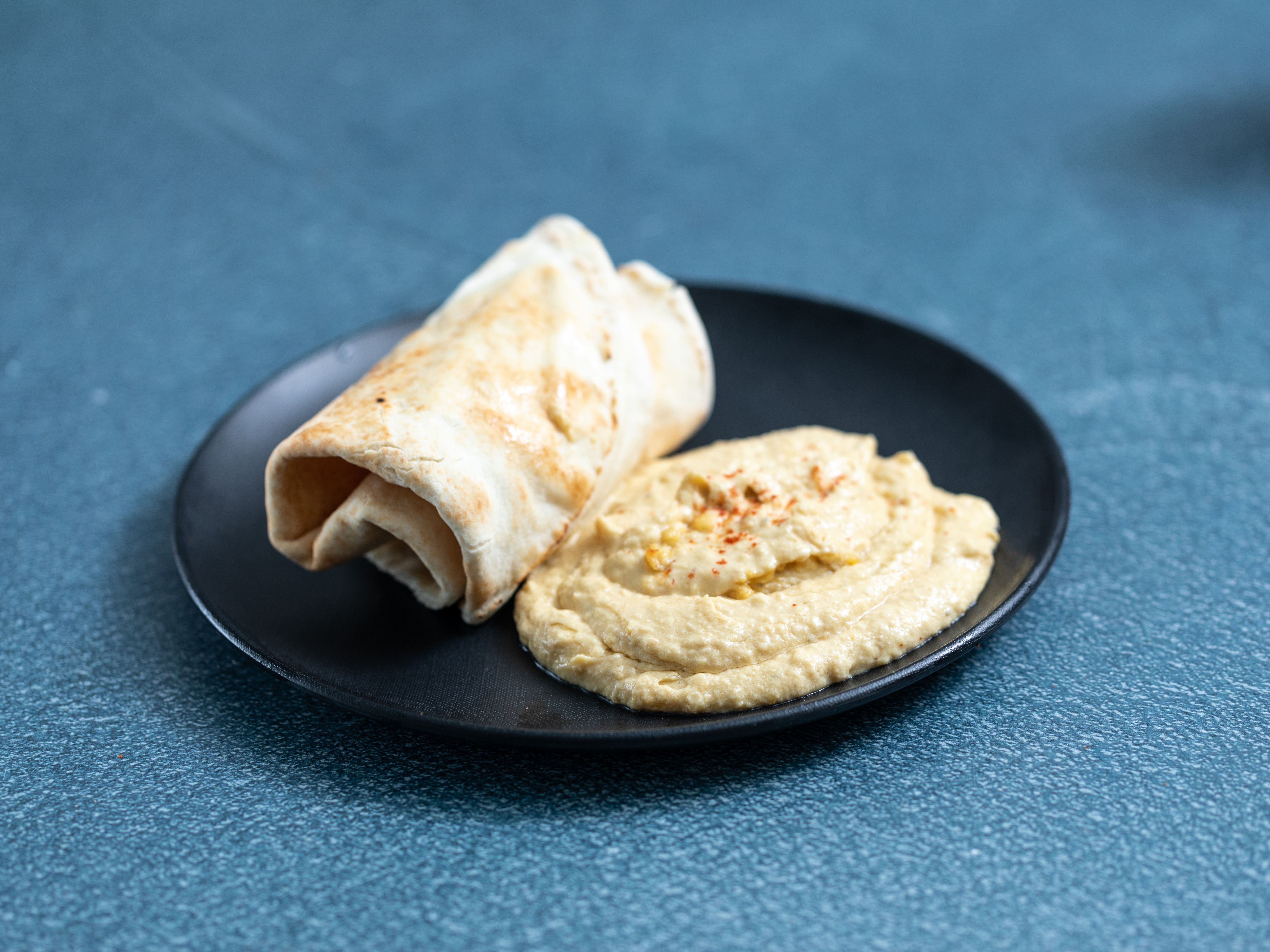 Order Hummus Side food online from Azama grill store, Allston on bringmethat.com