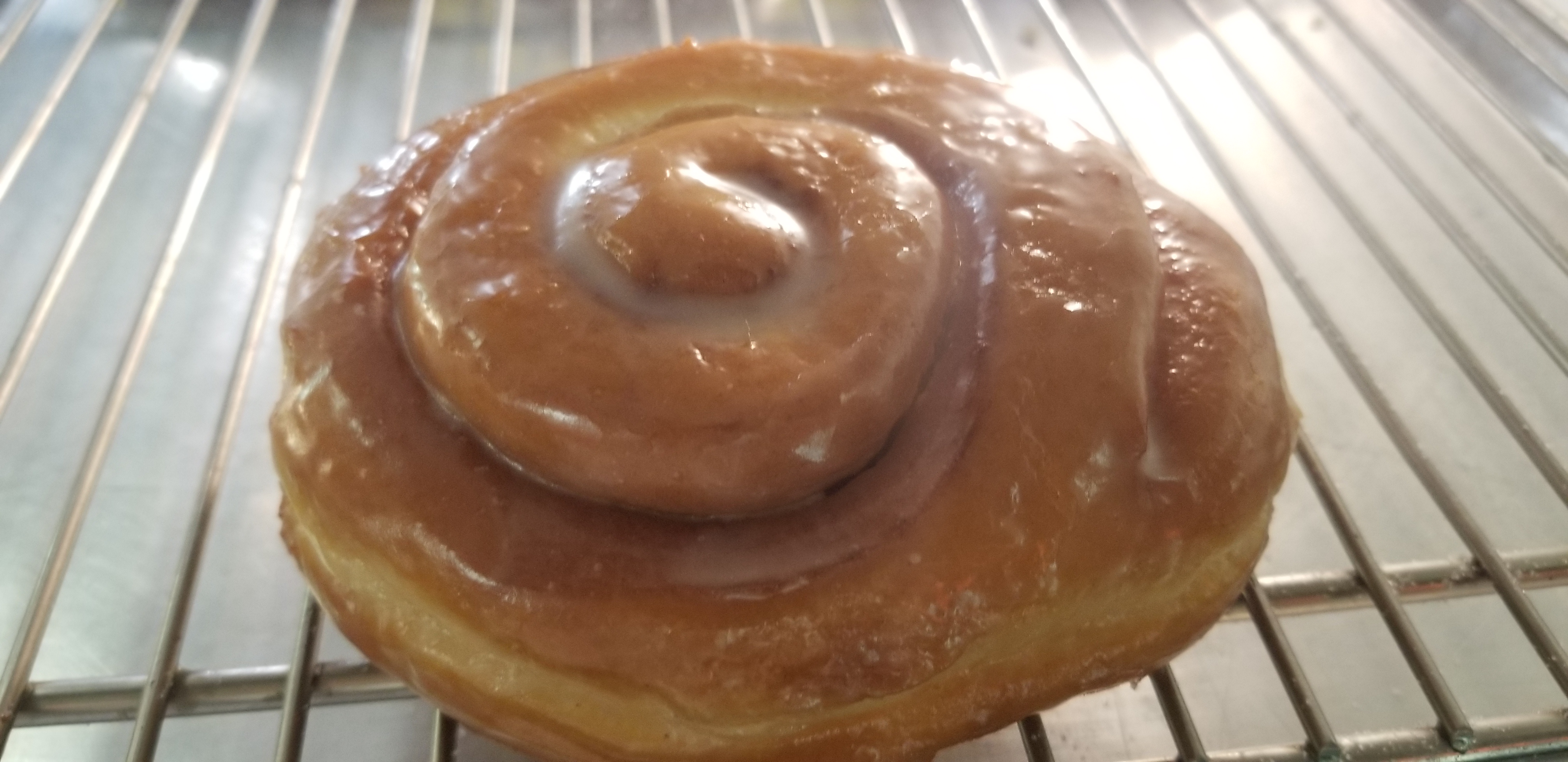 Order Cinnamon Roll Donut food online from Magee Donuts store, Los Angeles on bringmethat.com