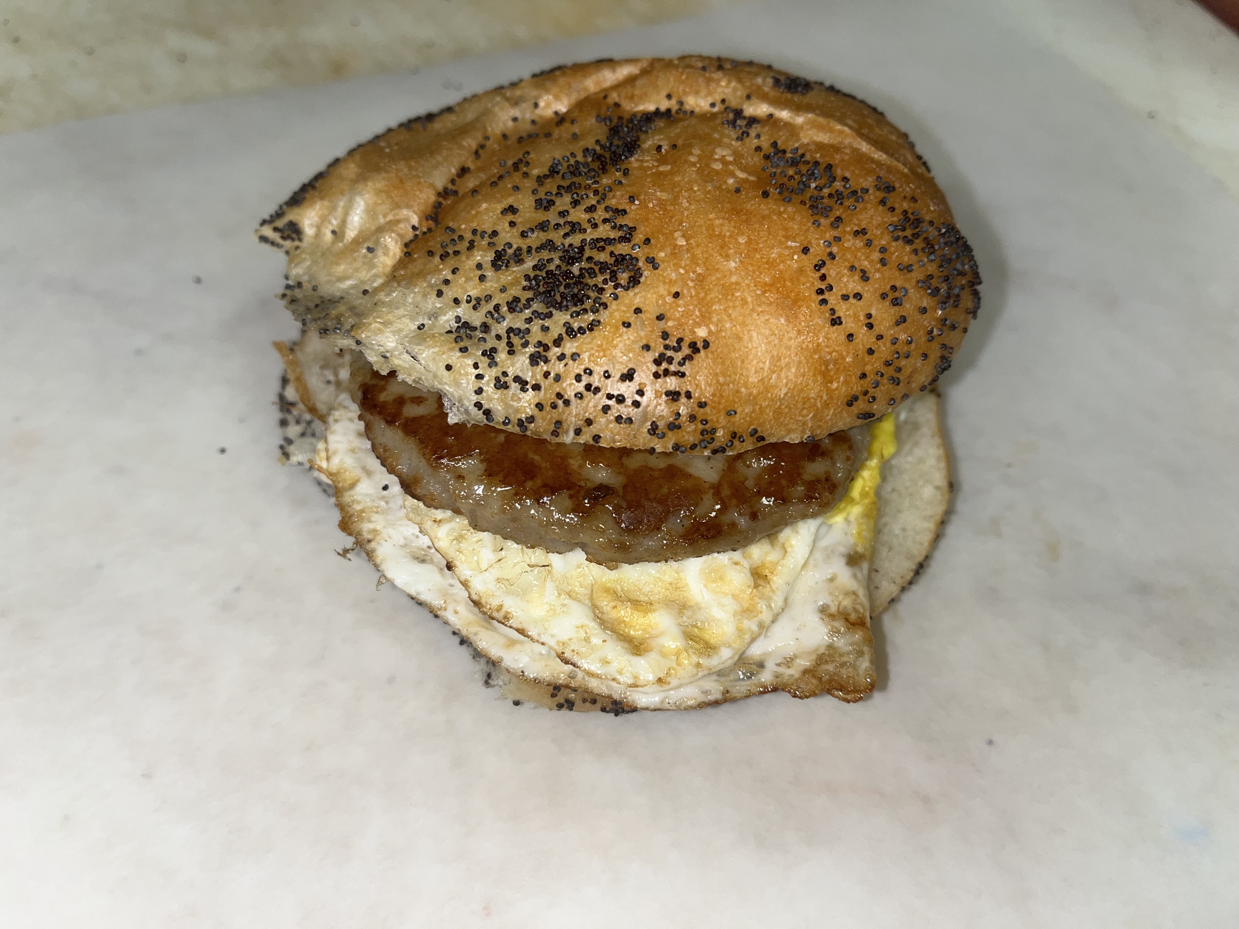 Order 2 Eggs with sausage on a Roll food online from Bagels N Brunch Deli store, Islip Terrace on bringmethat.com