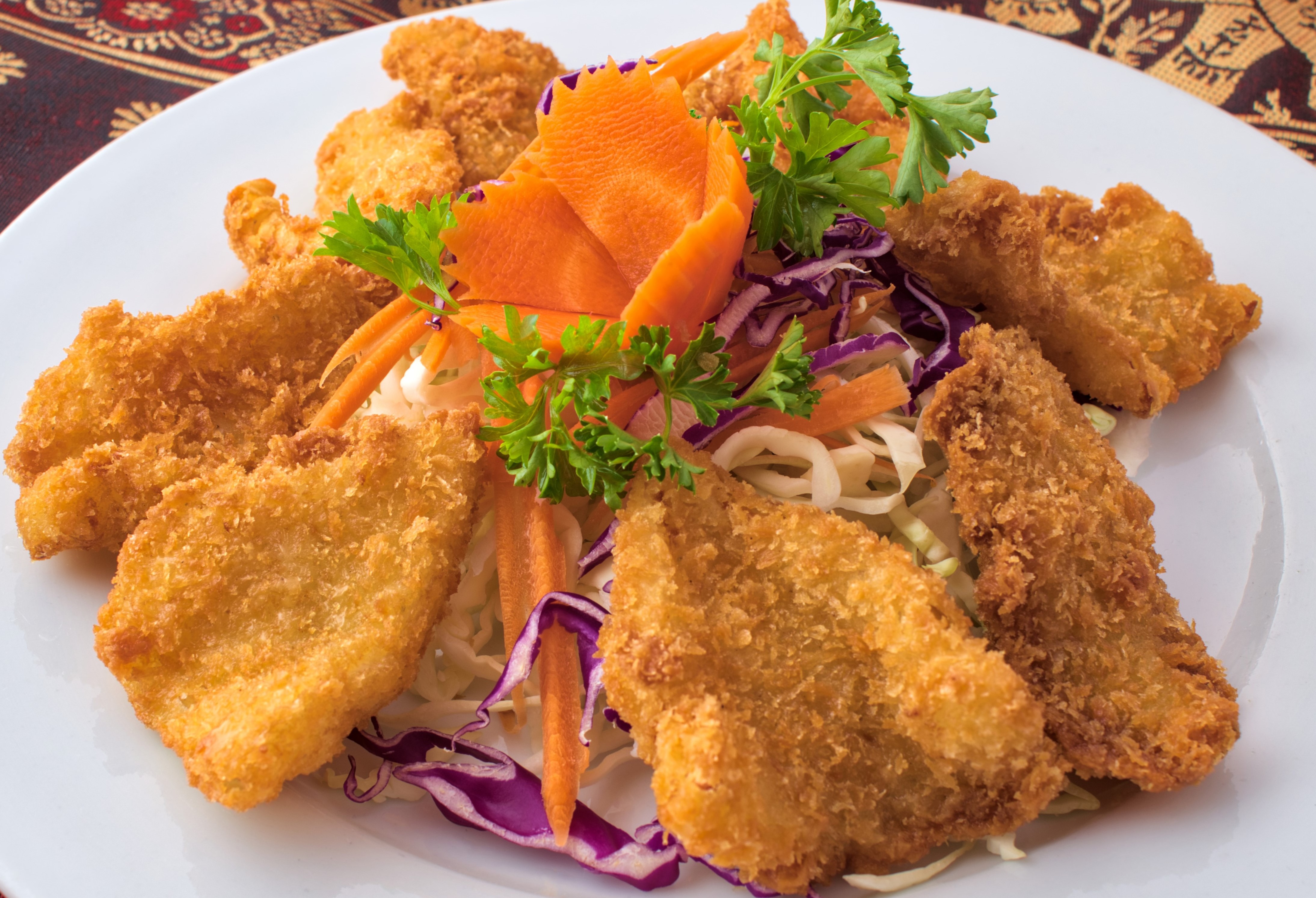Order Fried Calamari food online from Sweet Basil Thai Cuisine store, Hurst on bringmethat.com
