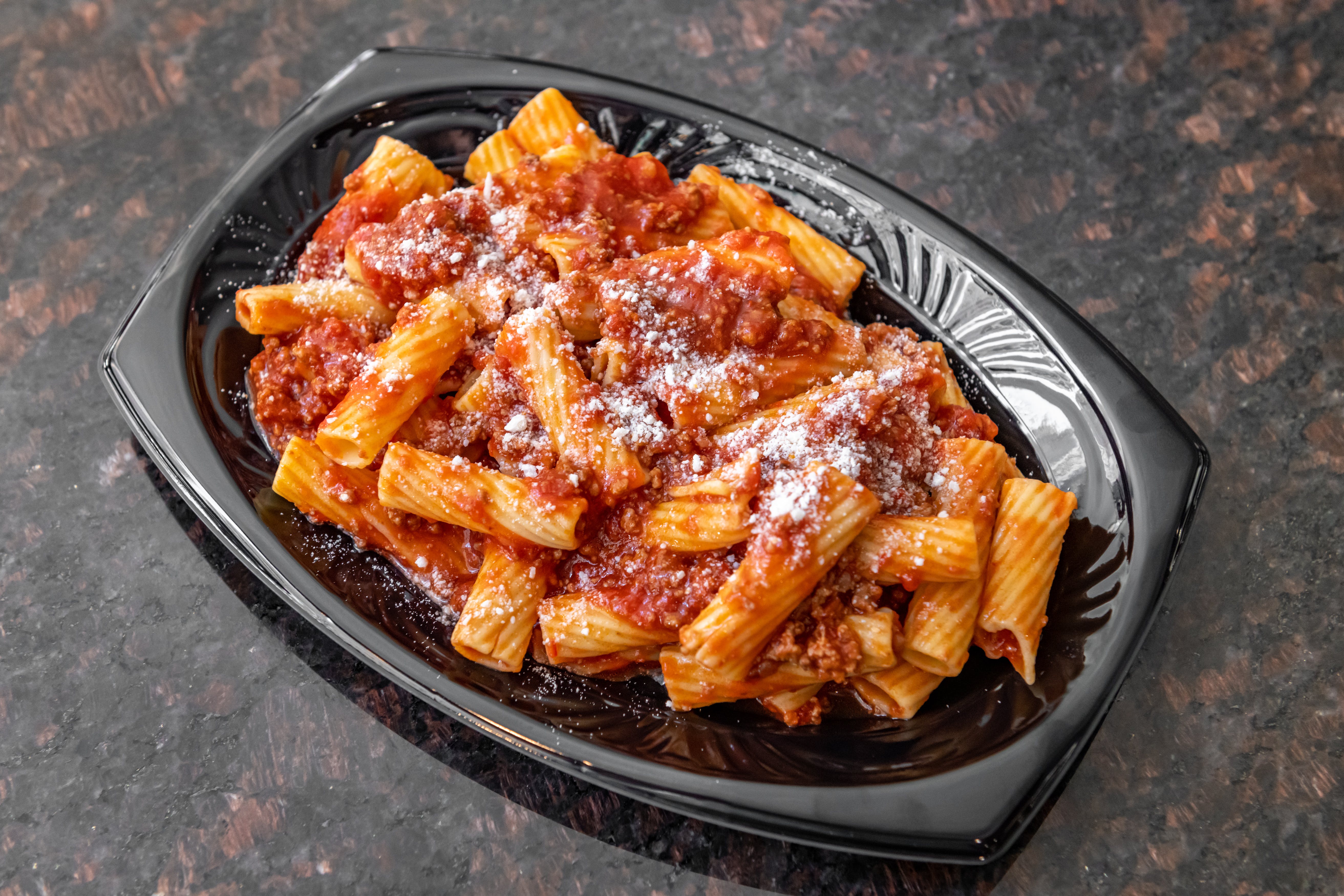 Order Rigatoni Bolognese - Pasta food online from Bravo Pizza store, New York on bringmethat.com