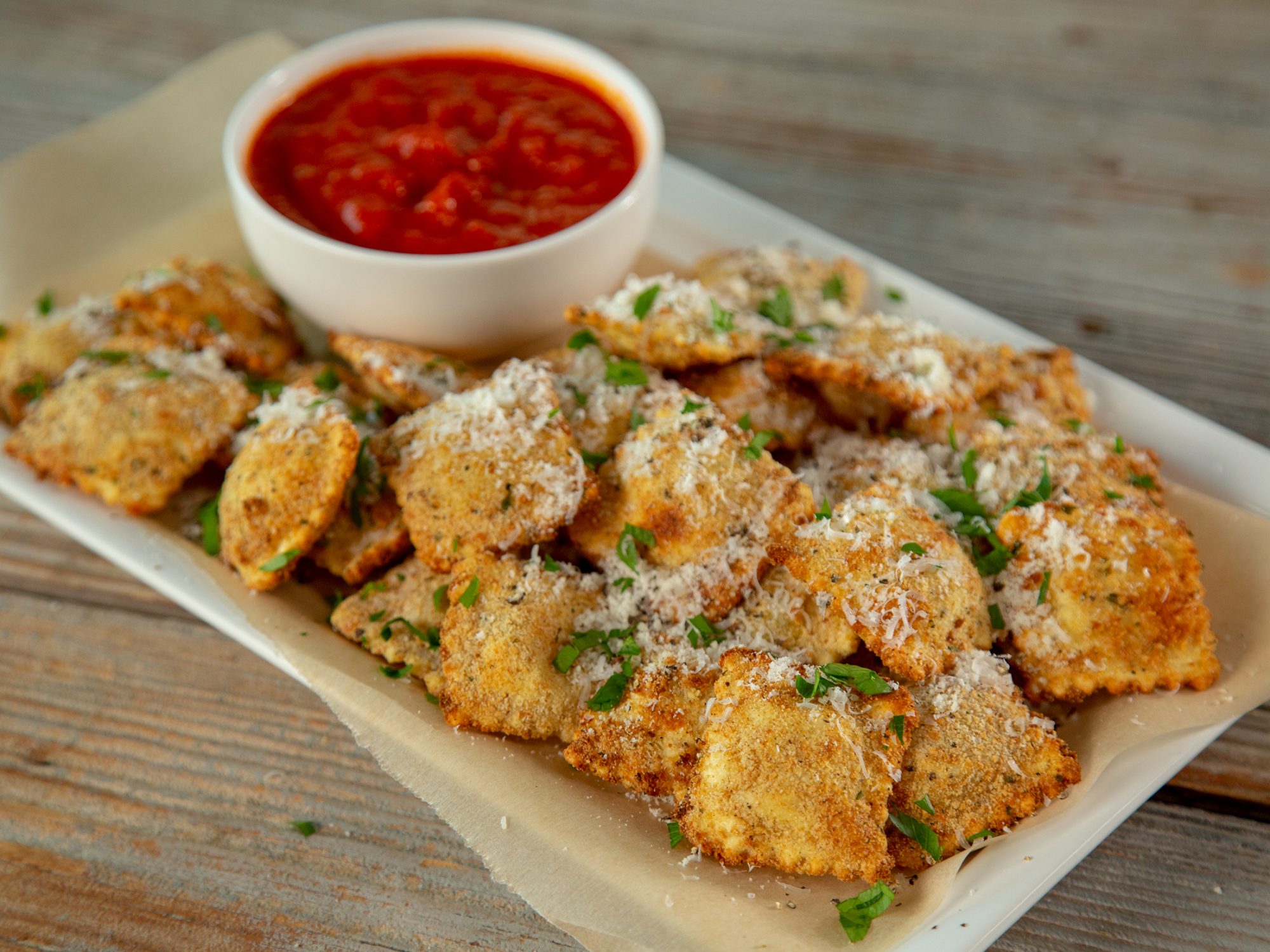 Order Fried Ravioli food online from Rocky's Pizza store, Huntersville on bringmethat.com