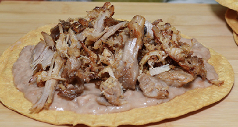 Order Carnitas Tostada  food online from Federico Mexican Food store, Albuquerque on bringmethat.com