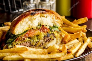 Order Chef's Burger - 1/2 lb Angus Chuck & Assorted veggies w/Fries food online from Milano Cafe & Deli store, Burbank on bringmethat.com