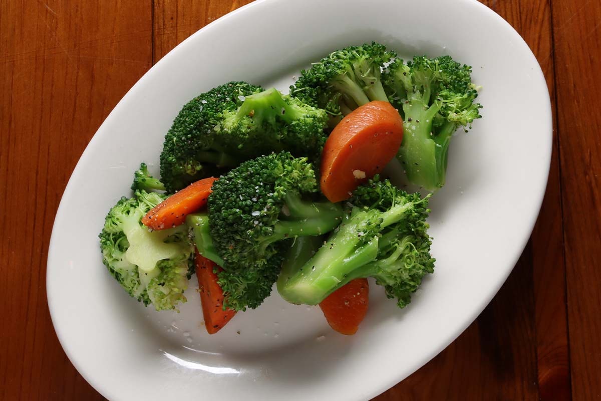 Order Broccoli & Carrot Medley food online from Boudreaux Cajun Kitchen store, Houston on bringmethat.com