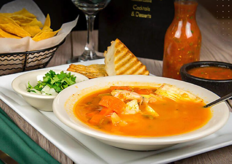 Order Seafood Soup food online from Tequila Sunrise store, Fishers on bringmethat.com