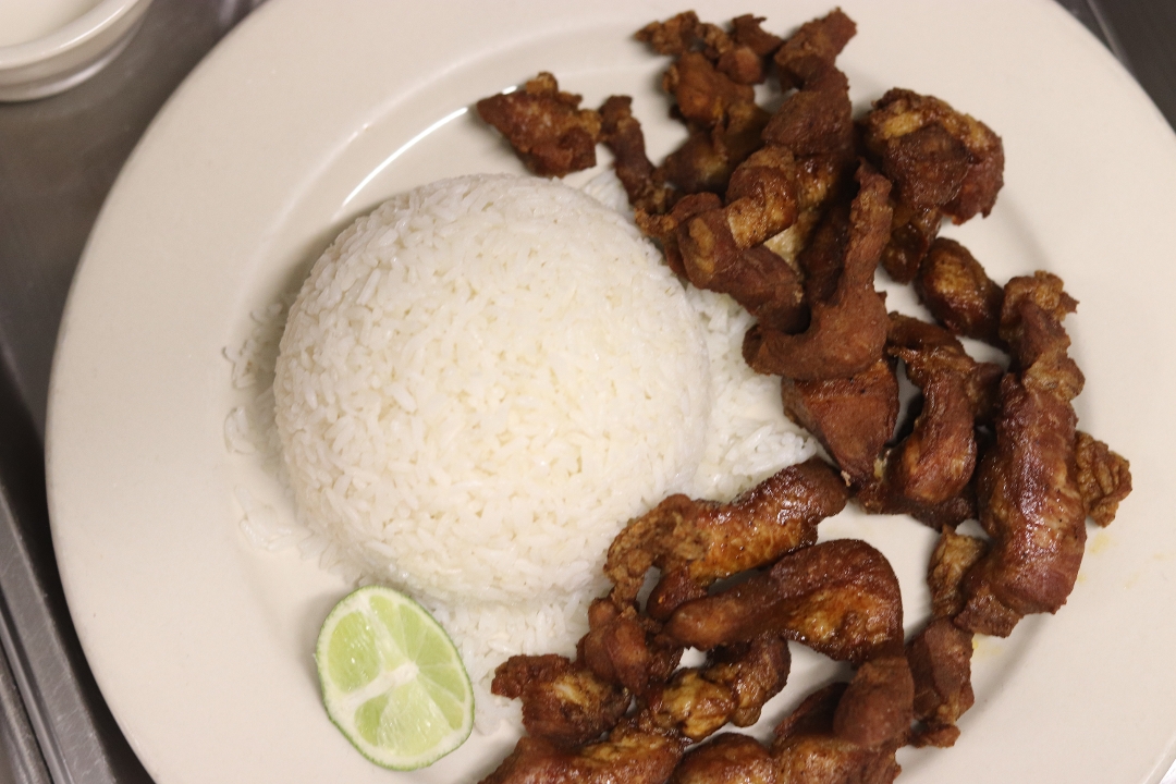Order Carne Frita - Fried pork strips food online from Don Quijote Restaurant store, Manchester on bringmethat.com