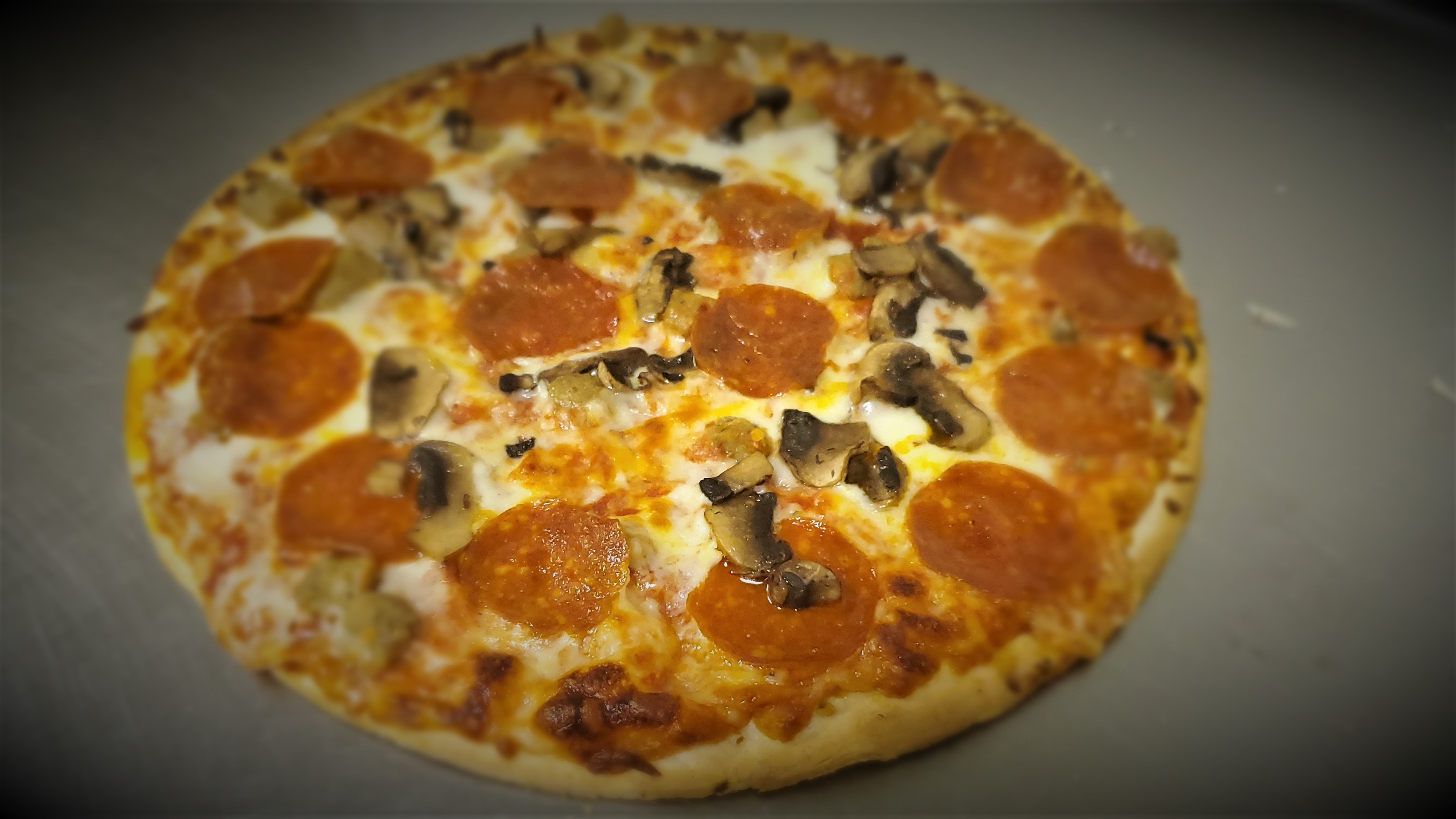 Order 12" Cheese Pizza food online from Downers Sand Club Sports Bar & Grill store, Downers Grove on bringmethat.com