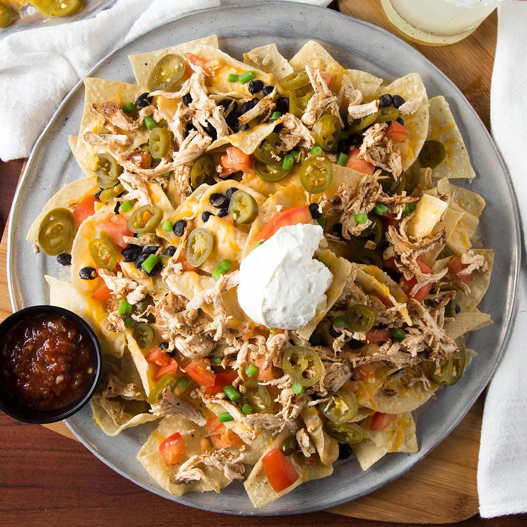 Order Nachos food online from The Well Bar & Grill store, Kansas City on bringmethat.com
