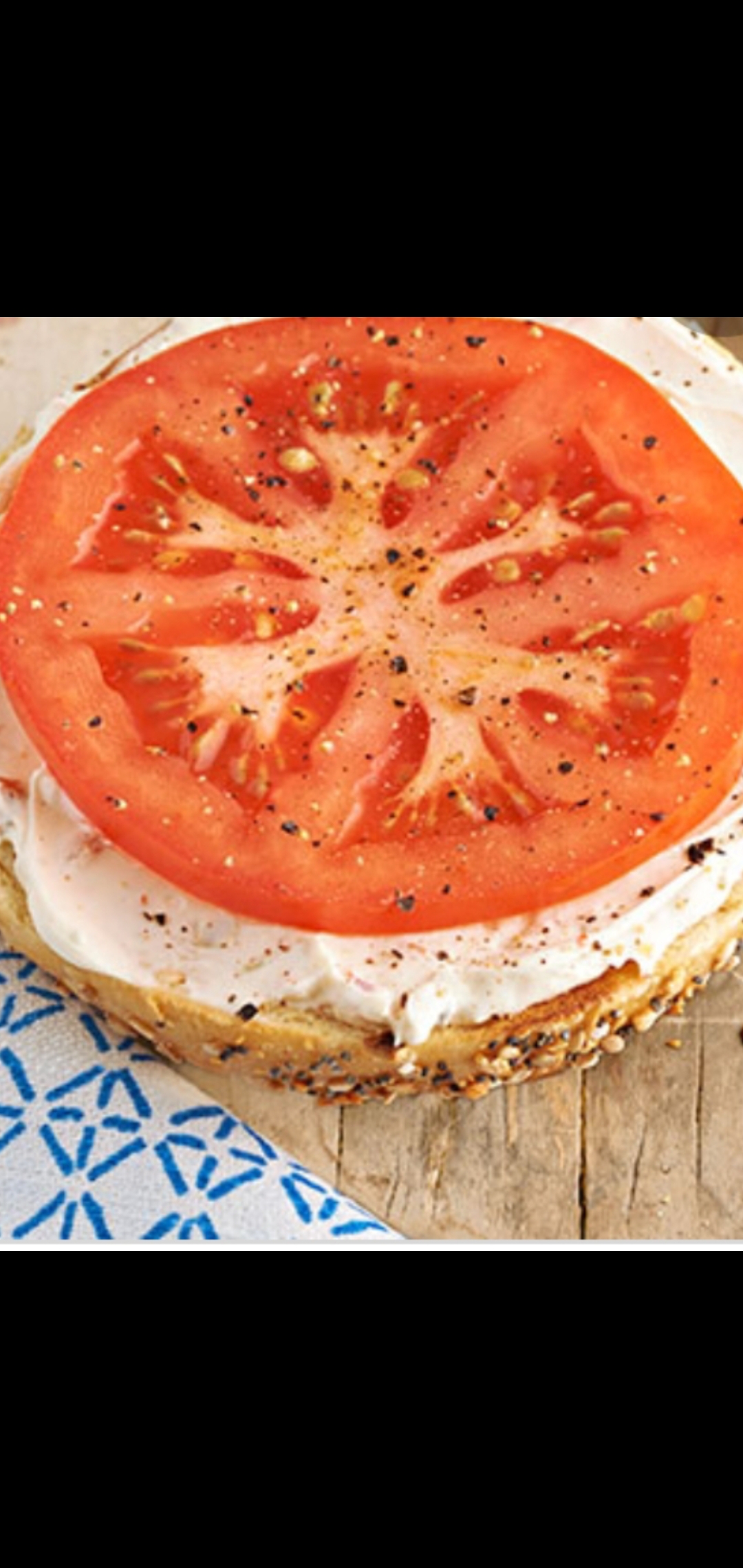Order Bagel with Cream Cheese and Tomato food online from American Gourmet Foods Deli store, New York on bringmethat.com
