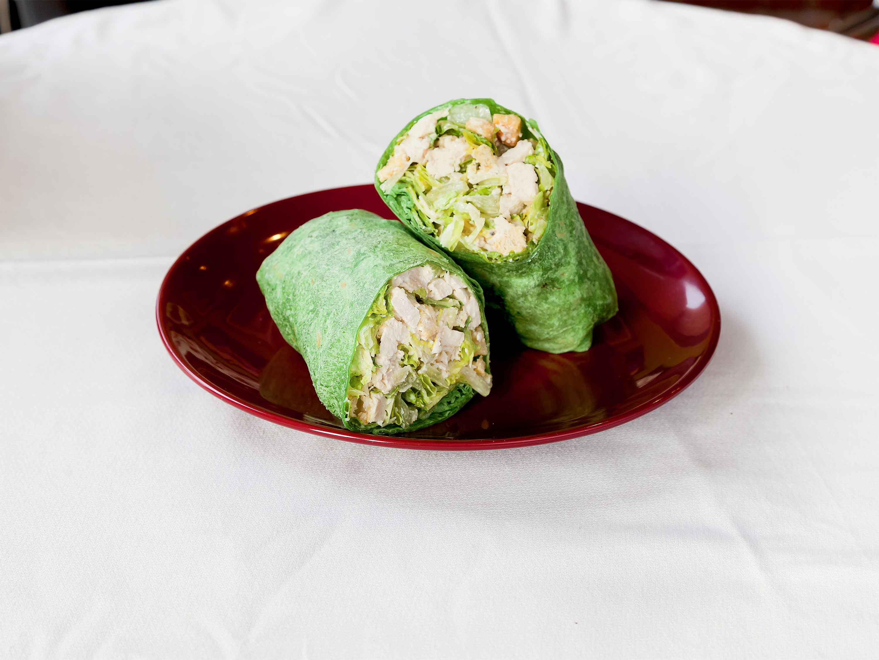 Order Chicken Caesar Wrap food online from Rossi Cafe & Deli store, Concord on bringmethat.com