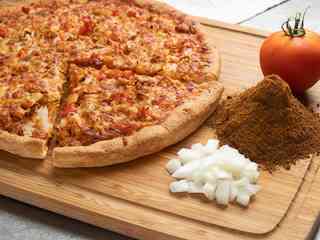 Order tikka masala pizza food online from Sarpino's Pizzeria store, Chicago on bringmethat.com