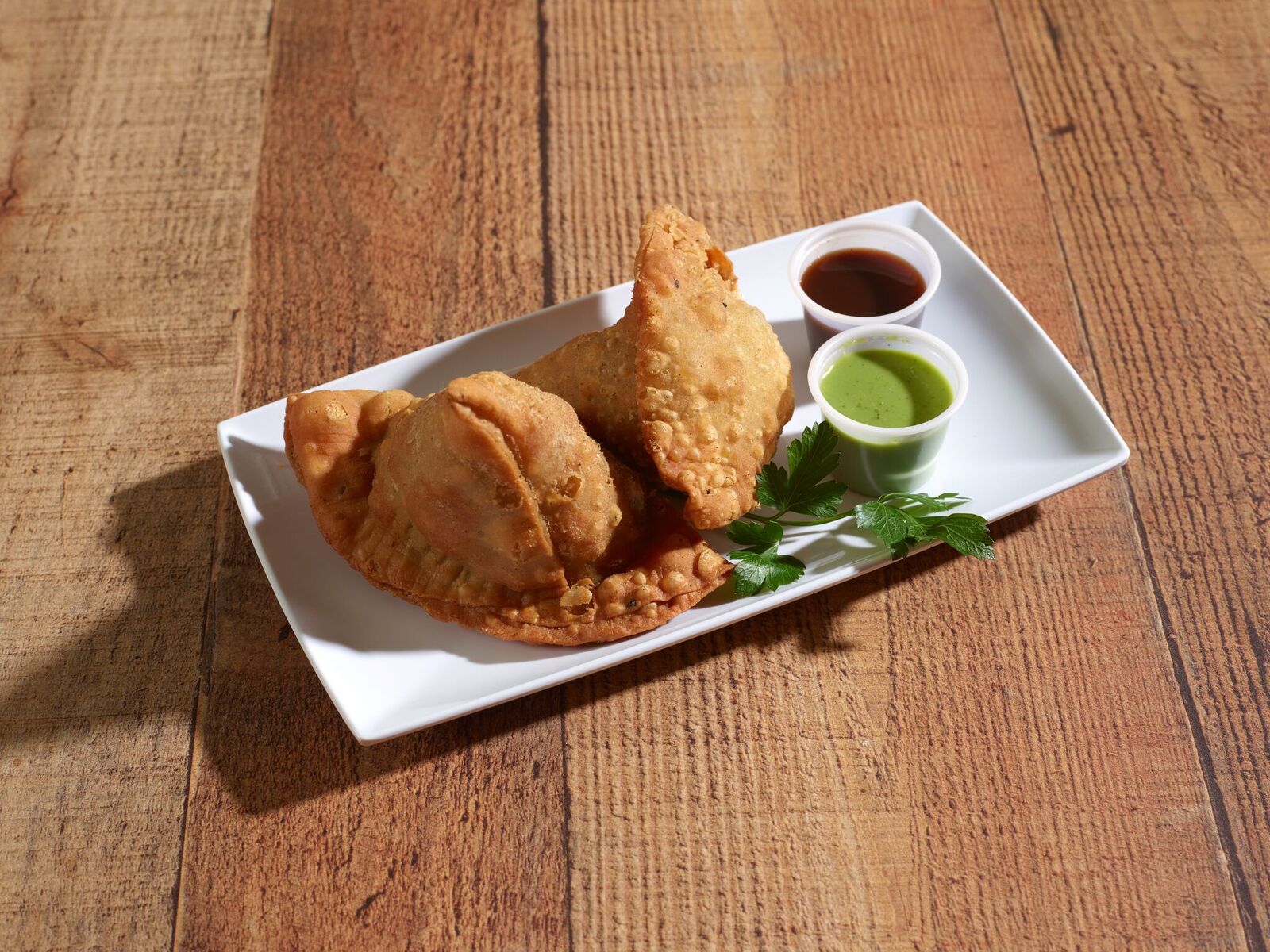 Order 2 Pieces Vegetable Samosas food online from Himalayas Indian store, Chamblee on bringmethat.com