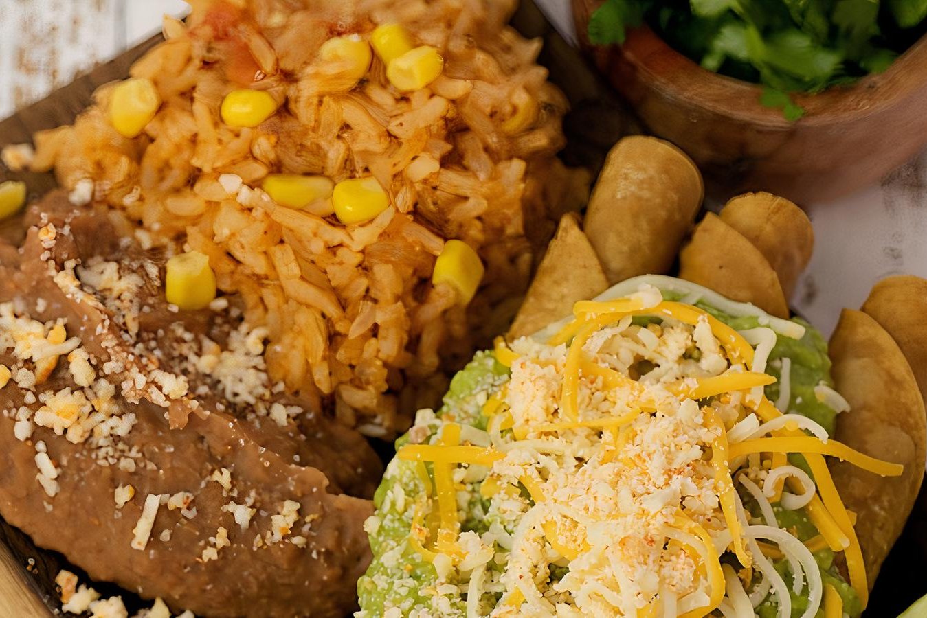 Order * Special 3 Rolled Tacos + Rice ＆ Beans food online from Burros & Fries store, Escondido on bringmethat.com