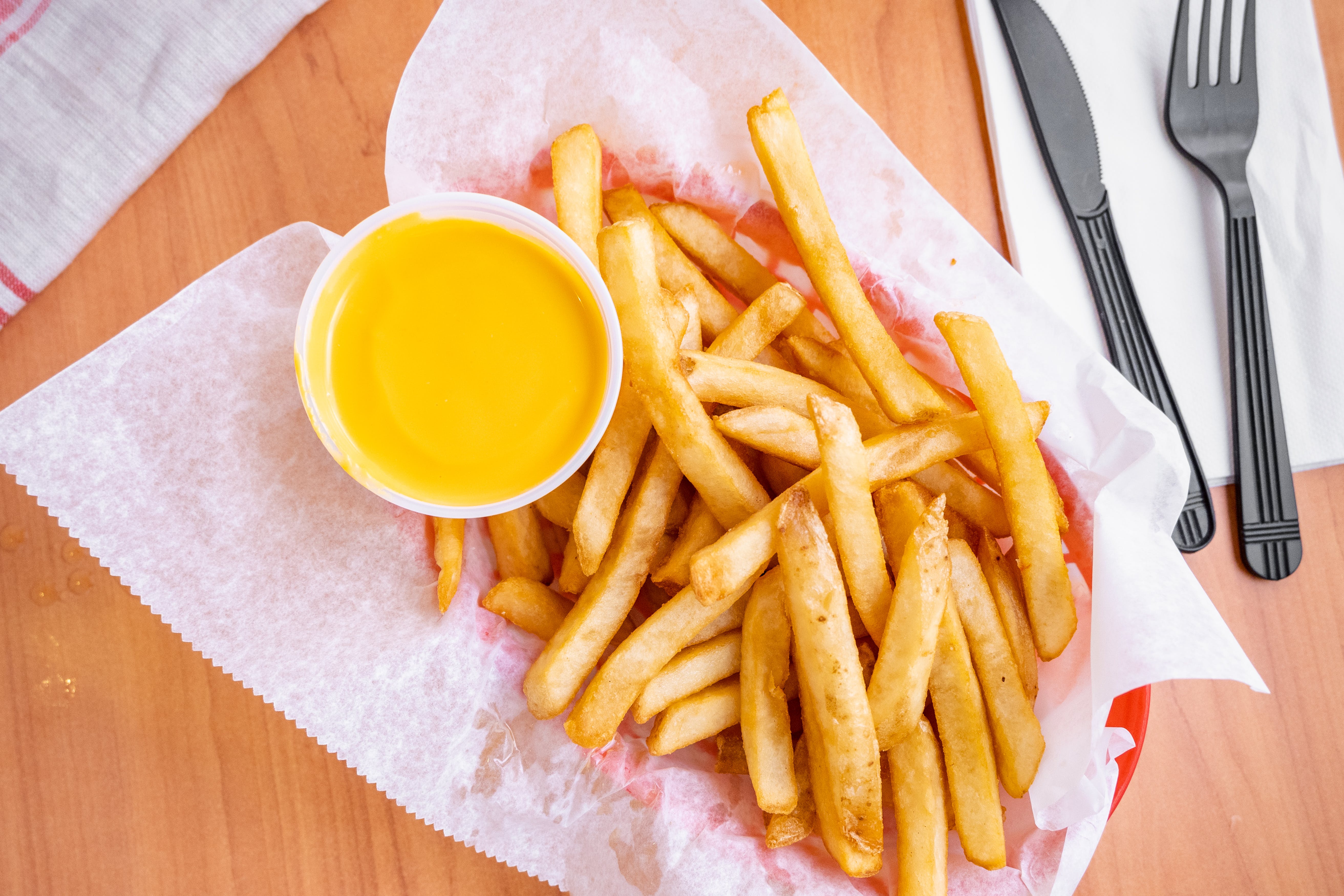 Order Cheese Whiz Fries - Side food online from Bella Roma Pizza Kitchen store, Springfield on bringmethat.com