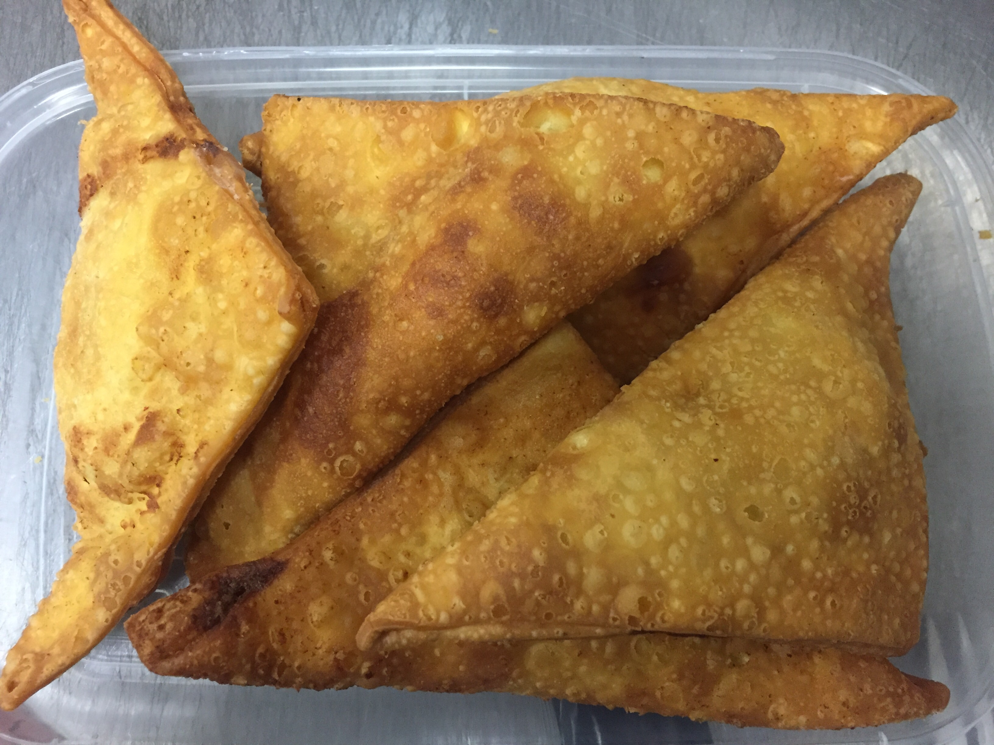 Order 105. Crab Rangoon food online from See Thru Chinese Kitchen store, Chicago on bringmethat.com